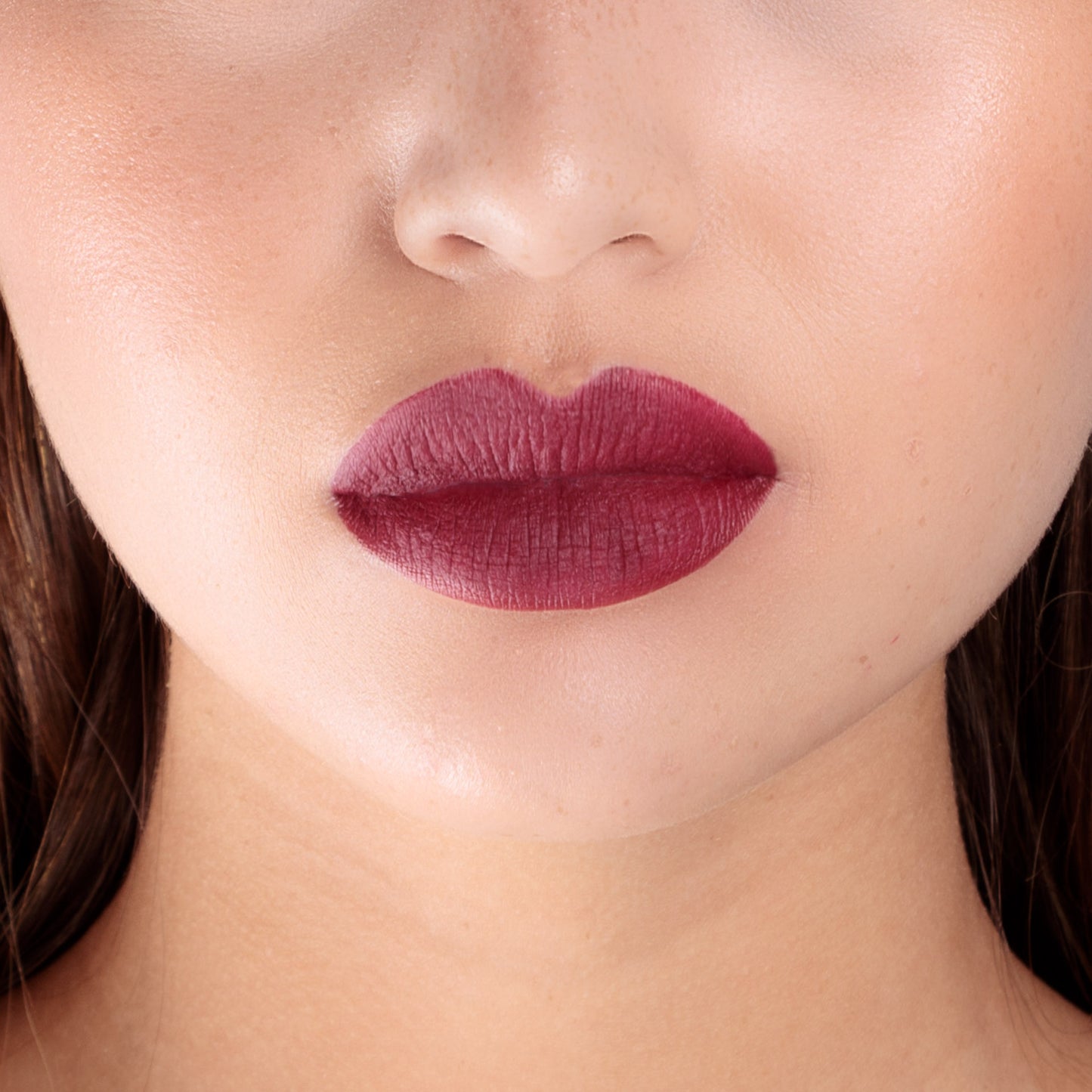 Closeup of a girls lips wearing LIPSAX in Mistress