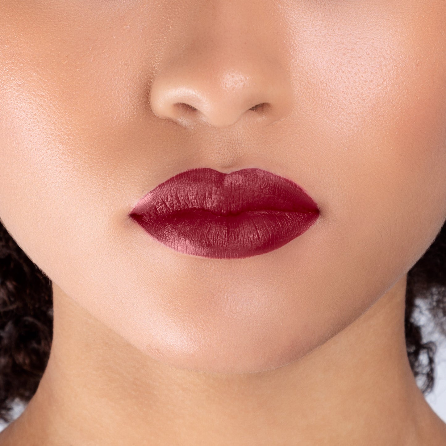 Closeup of a girls lips wearing LIPSAX in Mistress