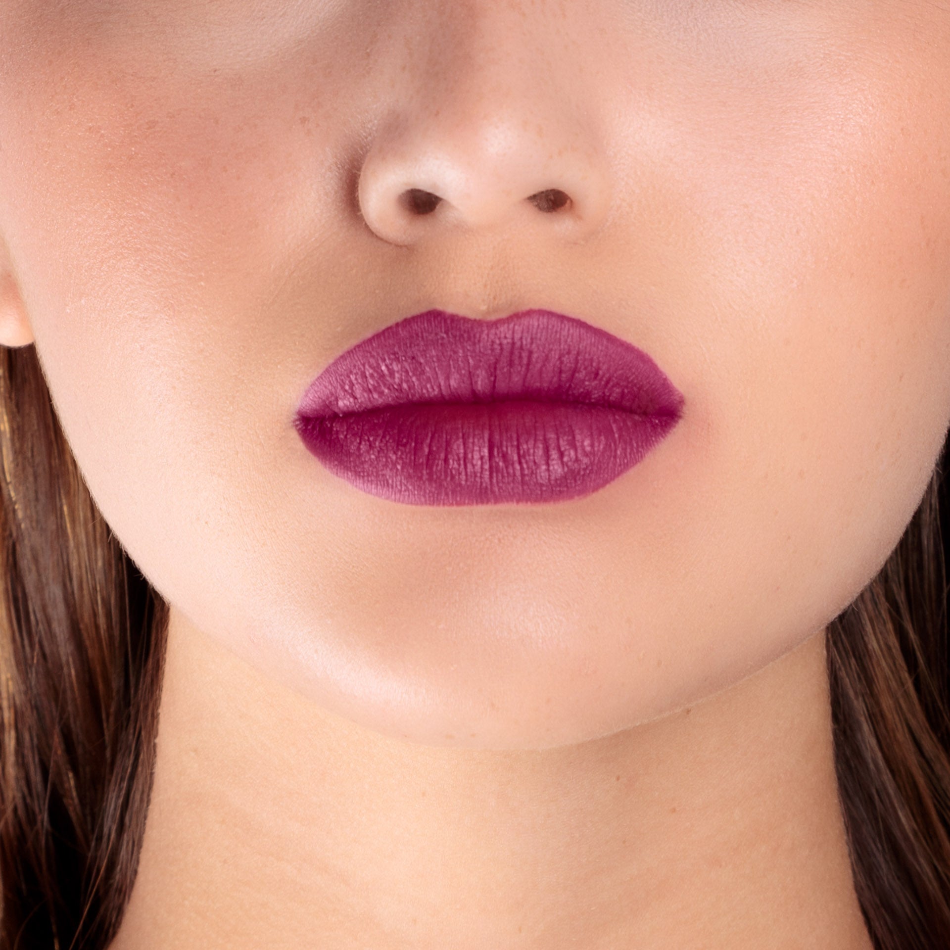 Closeup of a girls lips wearing LIPSAX in Scandalous