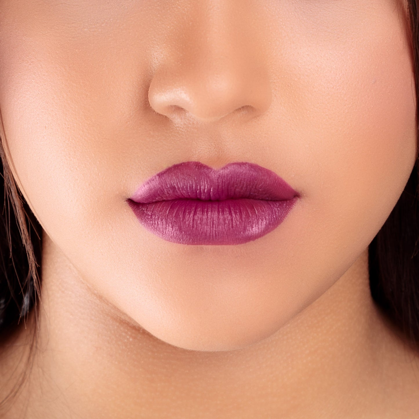 Closeup of a girls lips wearing LIPSAX in Scandalous