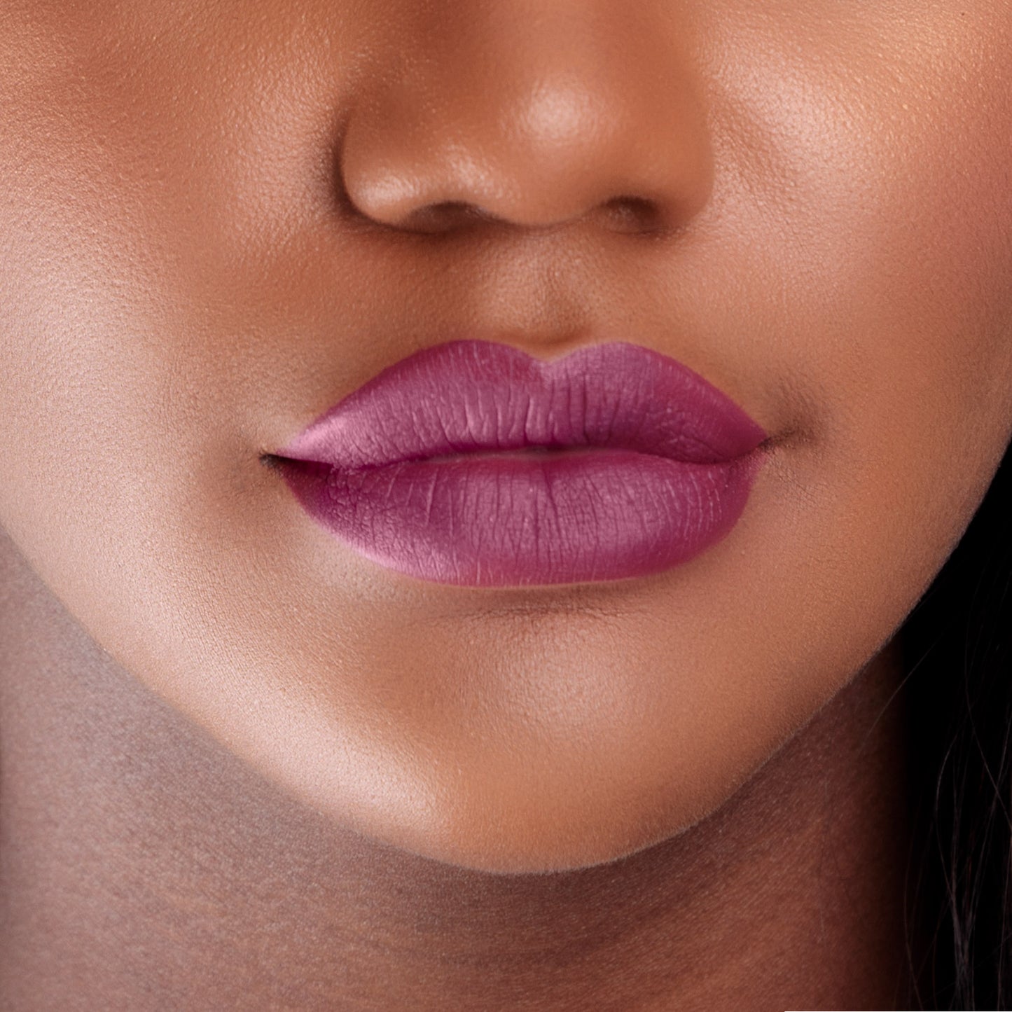 Closeup of a girls lips wearing LIPSAX in Scandalous