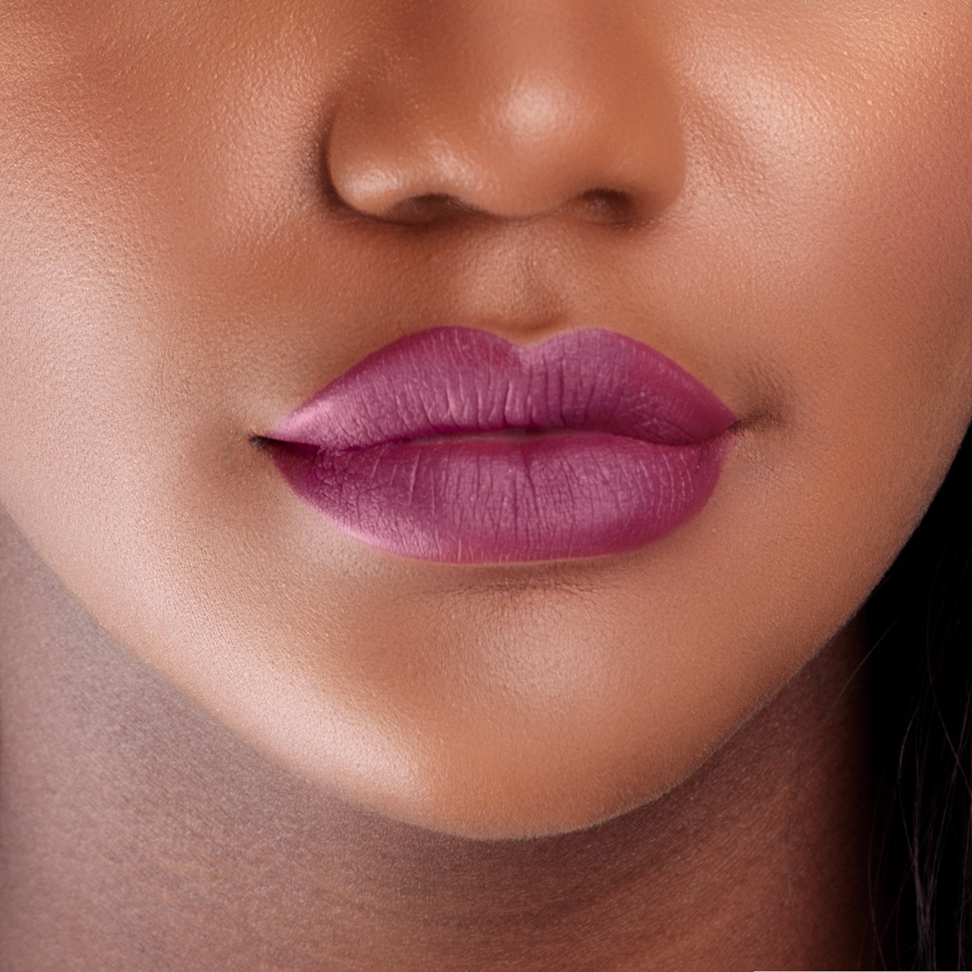 Closeup of a girls lips wearing LIPSAX in Scandalous