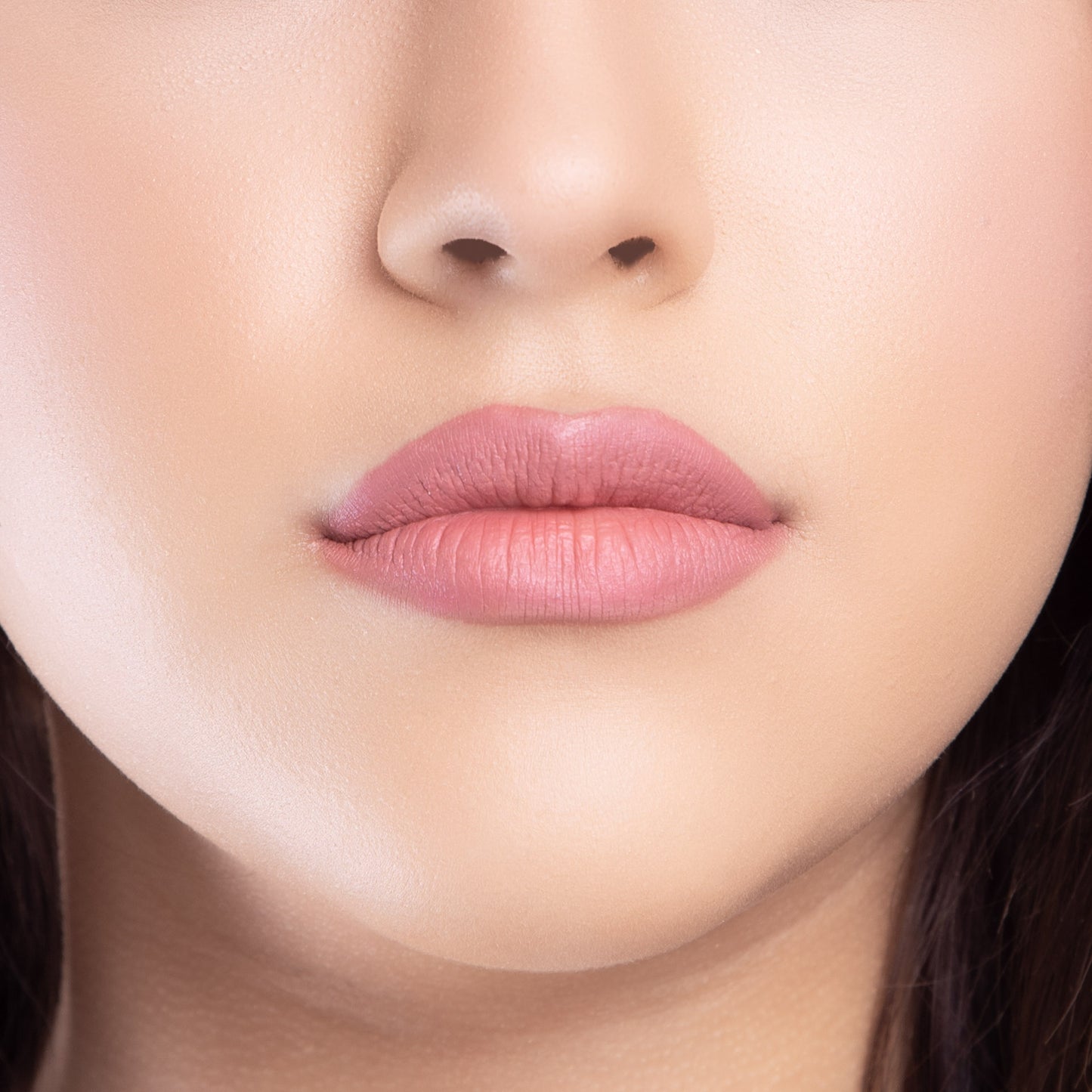 Closeup of a girls lips wearing LIPSAX in Undressed